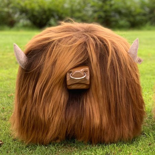 Highland Bull Footstool in Chestnut with a Nose Ring Highland bull footstool in chestnut with a nose ring