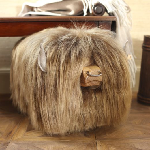 Highland Bull Footstool in Honey with a Nose Ring Highland bull footstool in honey with a nose ring